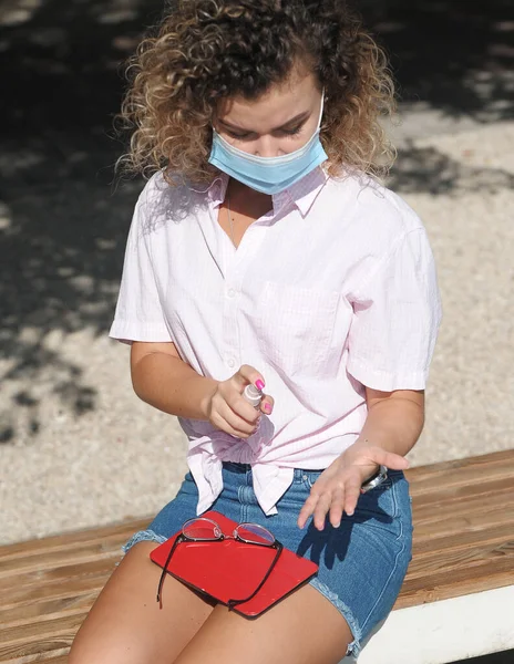 Beautiful Woman Mask Face Sanitizers Her Hands Working Laptop Outdoors — Stock Photo, Image