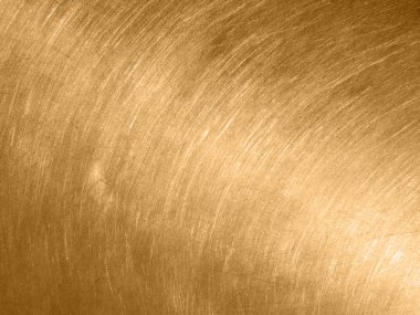 Dairesel çizik ile altın metal doku.