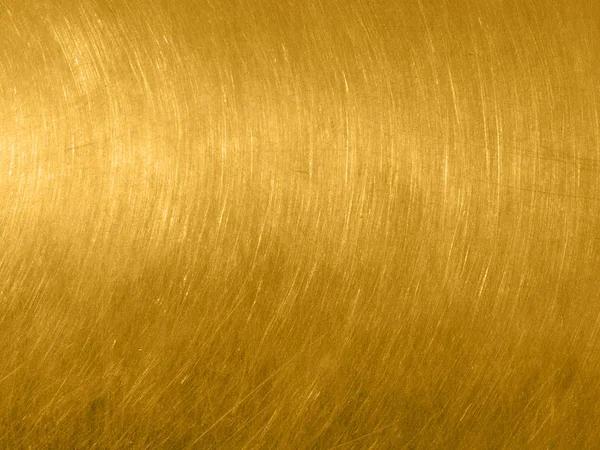 Dairesel çizik ile altın metal doku.