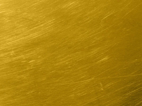 Textura de metal dourado com arranhões circulares . — Fotografia de Stock