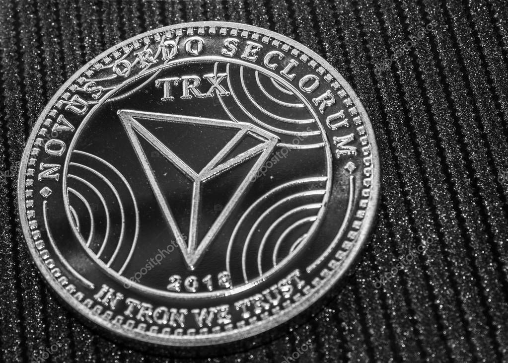 A fragment of the coin cryptocurrency tron closeup. TRX macro.