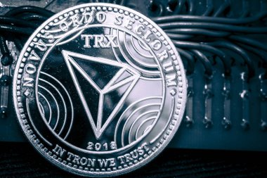 Cryptocurrency Thron parlak gri bir arka plan üzerinde para. TRX.
