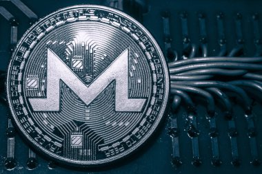 Cryptocurrency Monero teller ve devreleri arka plan üzerinde para. XMR