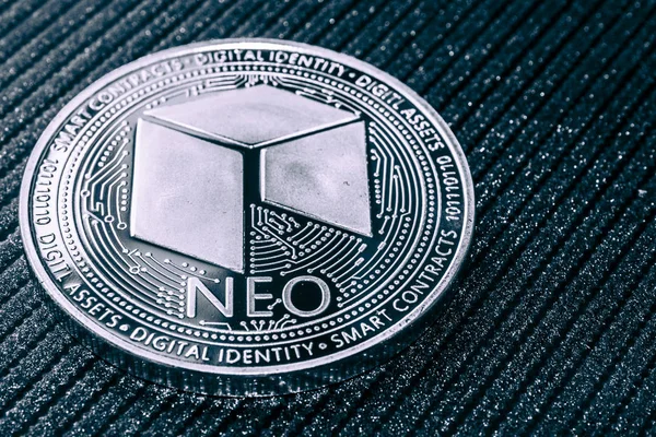 The Neo cryptocurrency coin on grey background. — Stock Photo, Image