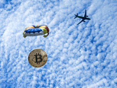 Sikke bitcoin uçaktan bir paraşüt üzerinde uçuyor. Atlayış belirteci. 