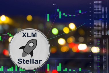 Sikke cryptocurrency Xlm gece şehir arka plan ve grafik.