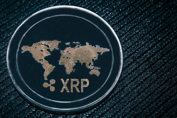 Криптовалюта XRP на сером фоне. Рябь — стоковое фото