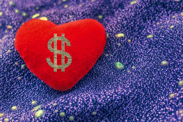 Love or money. Sign dollar on red heart