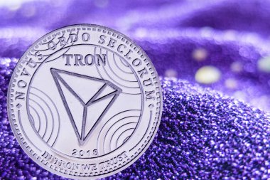 Cryptocurrency Tron modern neon arka plan üzerinde para. TRX