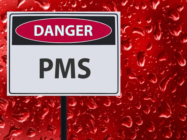 Sinal PMS e gota de sangue vermelho no vidro . — Fotografia de Stock
