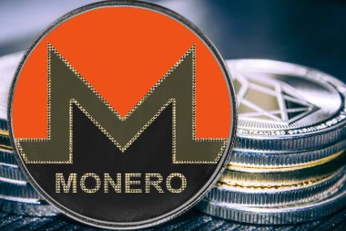 Sikke cryptocurrency monero sikke yığını arka plan üzerinde. xmr