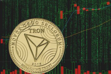 ikili kripto matris metin ve fiyat grafiği arka planda belirteç trx tron kripto para birimi.