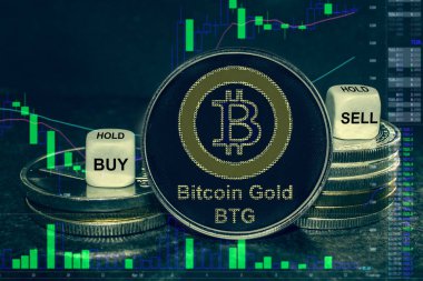 sikke kripto para Btg bitcoin altın sikke ve zar yığını. Satın almak, satmak, tutmak için döviz grafiği.