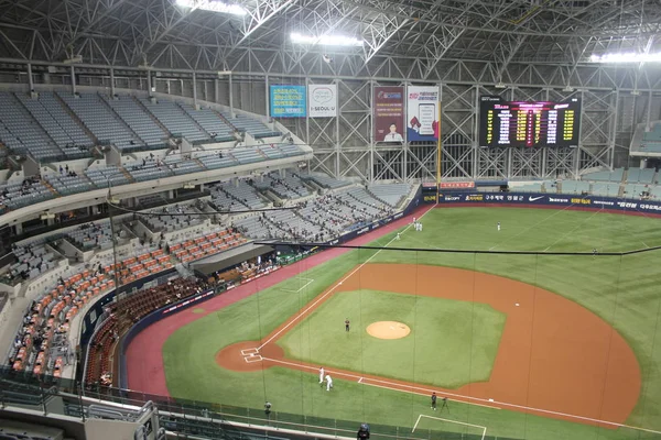 the appearance of an indoor baseball stadium