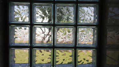 a crumpled and opaque window