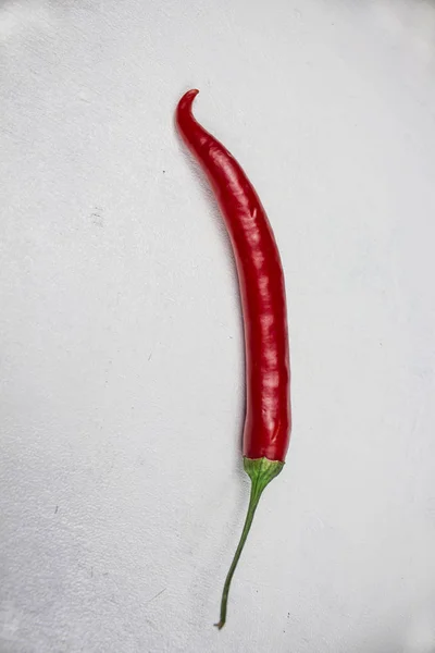 red pepper red peppers on a white background, isolate, one beautiful pepper, background, copyice