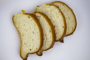 Bir dilim ekmek. Beyaz ekmek. Ekmek ahşap. Ekmek masanın üzerinde. Arka planı için ekmek. Kahvaltıda ekmek. Fırın ekmek. Ekmek pişir. Ekmek yemek için. Ekmek buğday üzerinden. Sabah için ekmek. Un Brea