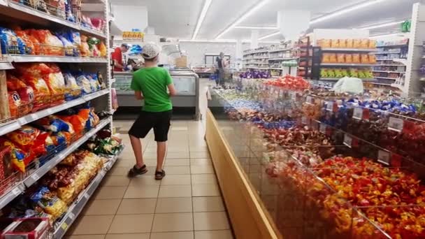 Supermarket Boy Walks Dances Store — Stock Video