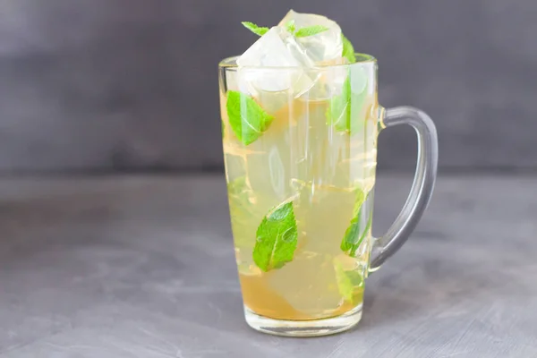 Fresh cool drink. Lemon uppercut with mint. Ice drink. Copyspace
