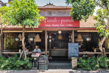 Front of Pundi-Pundi coffee and juice bar, Ubud Bali Indonesia. clipart