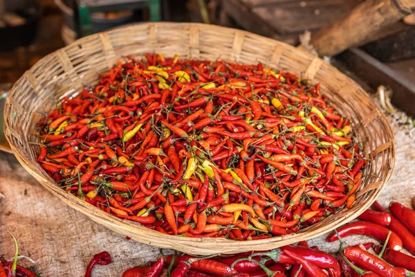 Basket of chili peppers at Terong Street Market in Makassar, Sou — Stock Photo, Image