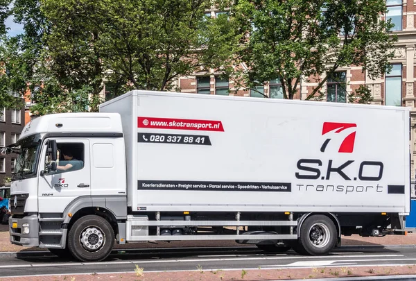 Large white SKO transport truck, Amsterdam Netherlands. — Stock Photo, Image