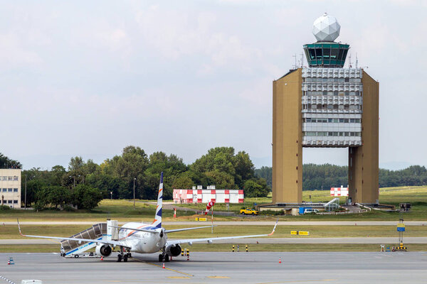 Budapest, Hungary - 08 15 2020: Control tower at the Ferenc Liszt International Airport in Budapest, Hungary on a summer day.