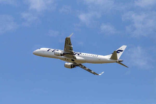 Budapest, Hungary - 08 16 2020: Finnair's Embraer ERJ-190 is taking off from the Ferenc Liszt International Airport in Budapest, Hungary on a summer day.