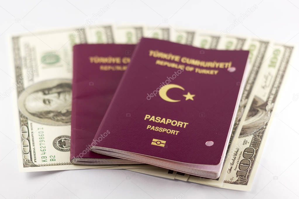 Turkish passport and dollar bills isolated
