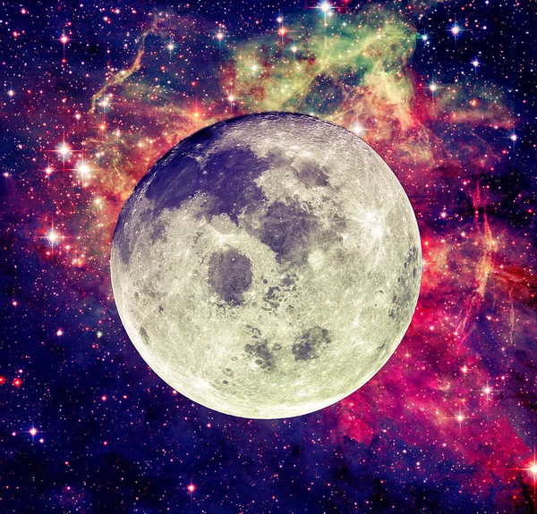 Full moon on the background of nebula and stars. Elements of this image furnished by NASA.