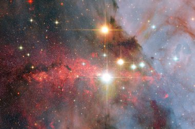 Bulutsular ve uzayda çok yıldız. Nasa tarafından döşenmiş bu görüntü unsurları.