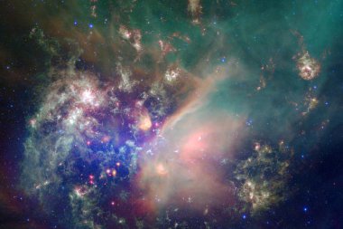 Bulutsular ve uzayda çok yıldız. Nasa tarafından döşenmiş bu görüntü unsurları.