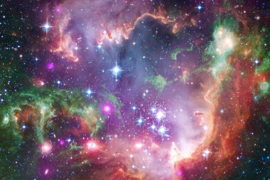 Bulutsular ve uzayda çok yıldız. Nasa tarafından döşenmiş bu görüntü unsurları.
