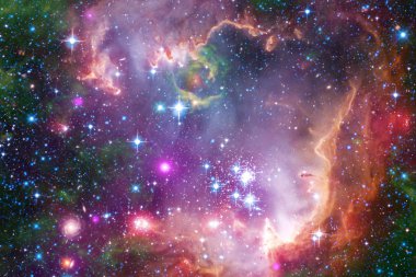 Bulutsular ve uzayda çok yıldız. Nasa tarafından döşenmiş bu görüntü unsurları.