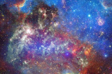 Nebula ve galaksiler uzayda. Bu görüntünün elementleri NASA tarafından desteklenmektedir.
