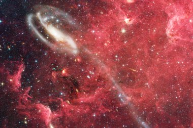 Nebula ve galaksiler uzayda. Bu görüntünün elementleri NASA tarafından desteklenmektedir.
