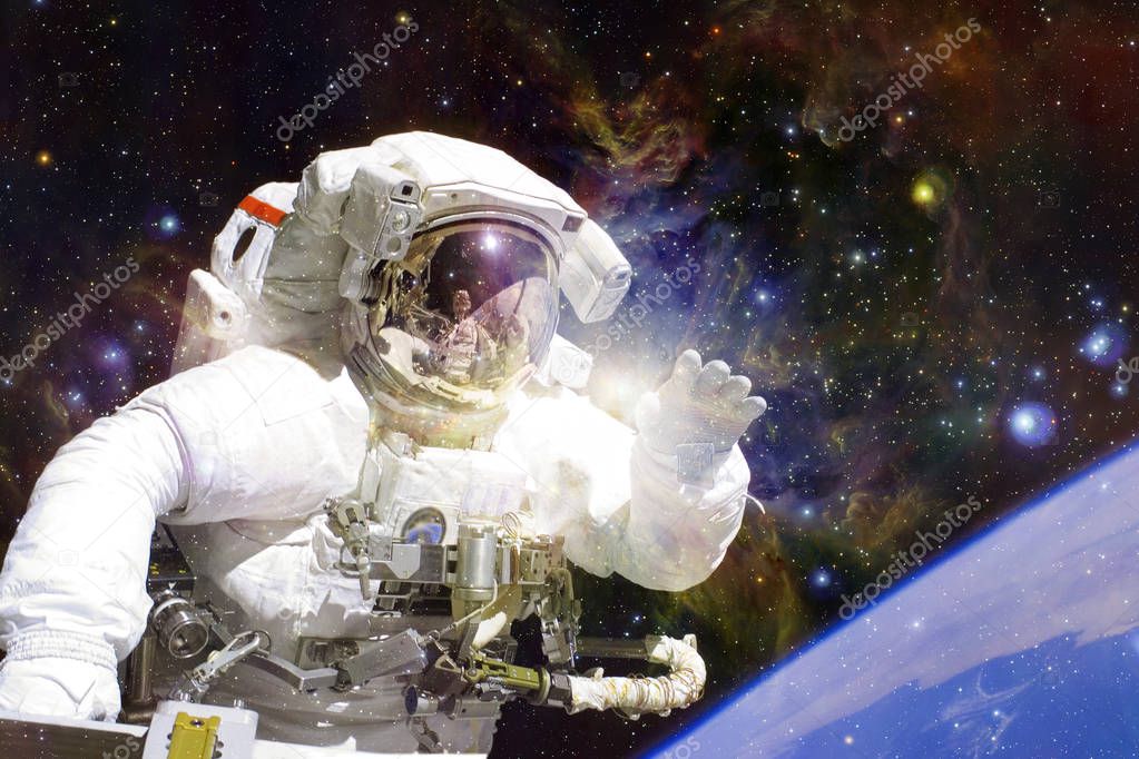 Astronaut in deep space. Elements of this image furnished by NASA