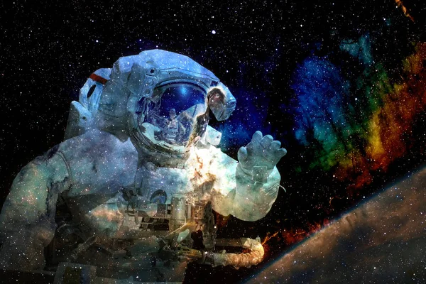 Astronaut in deep space. Elements of this image furnished by NASA — Stock Photo, Image