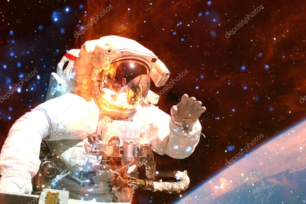 Astronaut in deep space. Elements of this image furnished by NASA