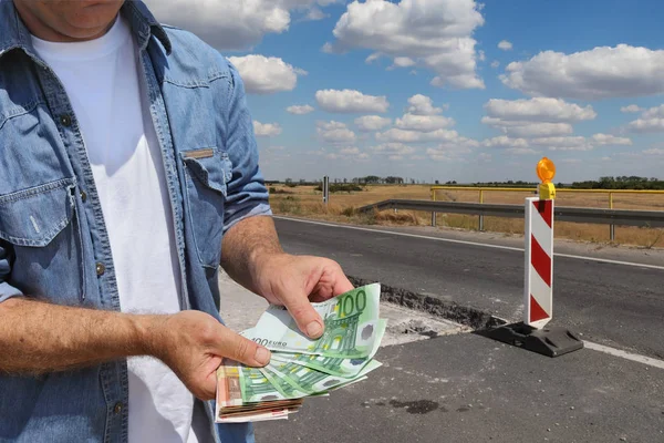 Roadworks Worker Holding Euro Money Road Signs Road Highway Reconstruction — Stock Photo, Image