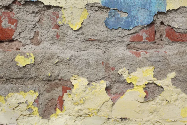 Closeup of weathered old damaged wall, bricks and mortar