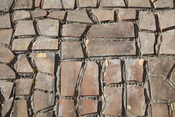 Old tiles recycling, making terrace or pavement using tile pieces, mortar and tile adhesive