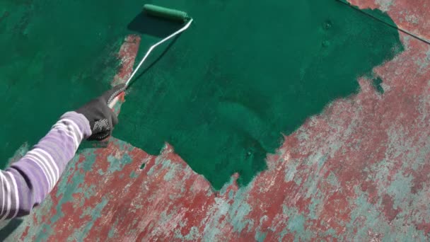 Female Worker Painting Old Metal Roof Plate Green Using Paint — Stock Video