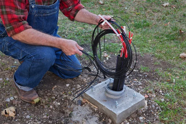 Worker Installing Optic Fiber Cables Internet Telephone Power Lines Installation — Stock Photo, Image