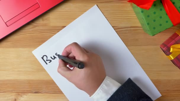 Illustration, nyår, man händerna skriver i en anteckningsbok, 2019 affärsmål — Stockvideo