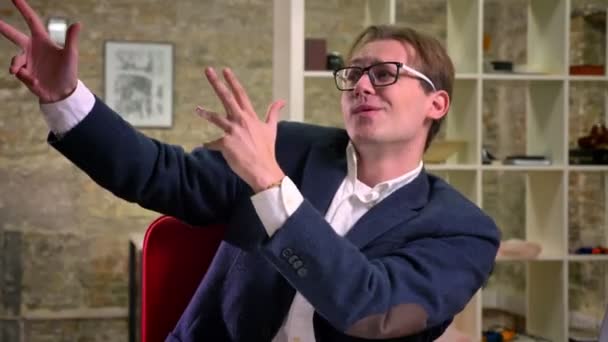 Cool Caucasian Businessman In Glasses And Suit Is Going Crazy With