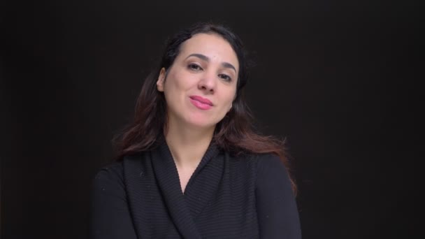 Closeup portrait of adult caucasian female being confident and positive smiling while looking at camera — Stock Video