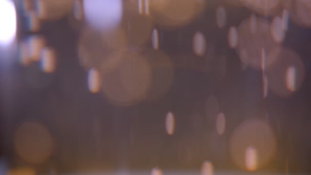 Closeup tiro de belas bolhas de poeira de cor marrom e fundo bokeh — Vídeo de Stock