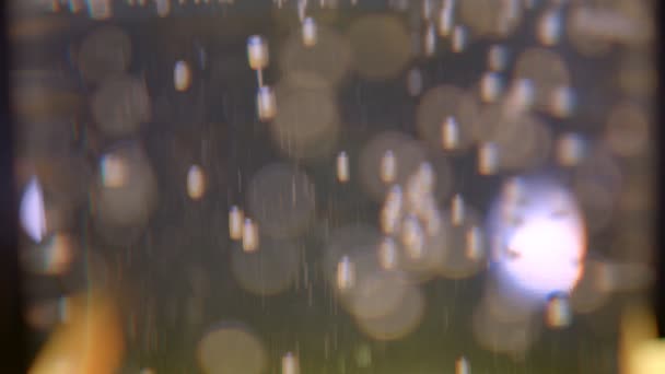 Primo piano sparare di belle bolle di polvere di colore marrone brillante e sfondo bokeh — Video Stock