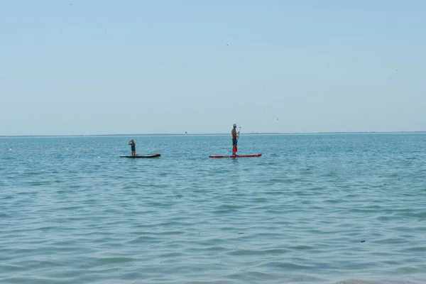 Kayaking. People are floating on a sea kayak. Adventure on the water.